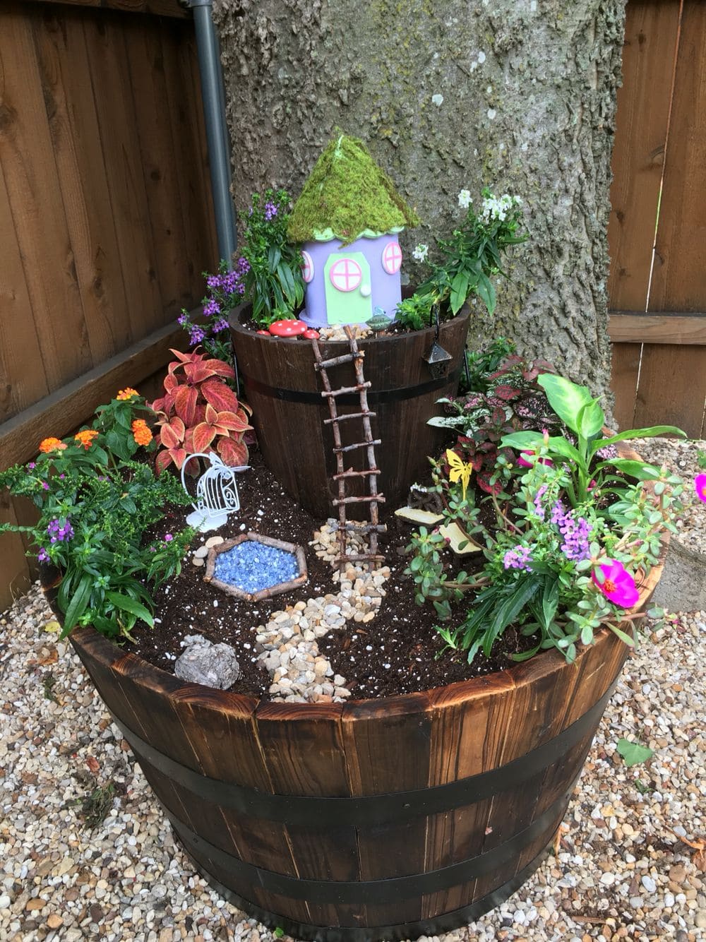 Whimsical Fairy Garden in a Barrel